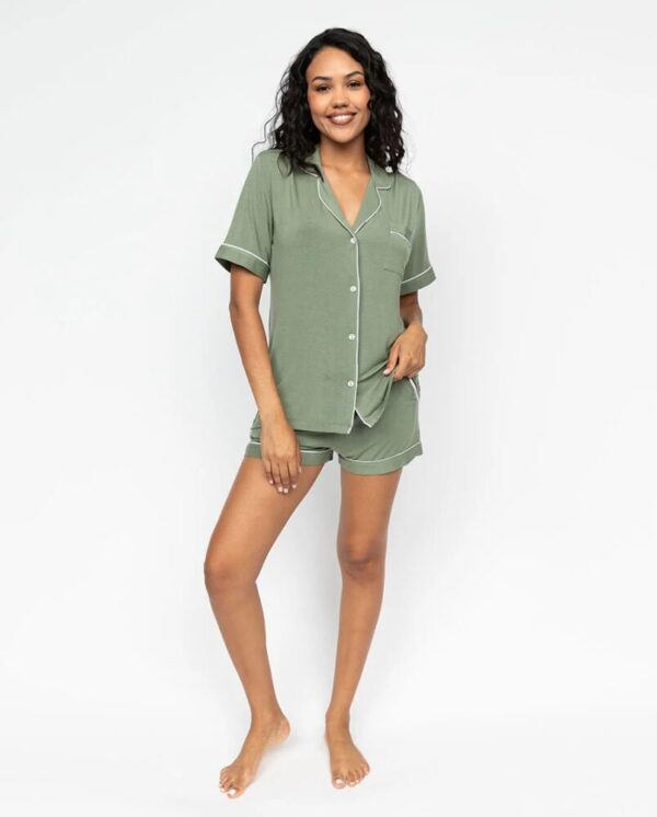 Model wearing Cyberjammies Lea Sage Green Short Pyjamas with short-sleeve top and coordinating shorts